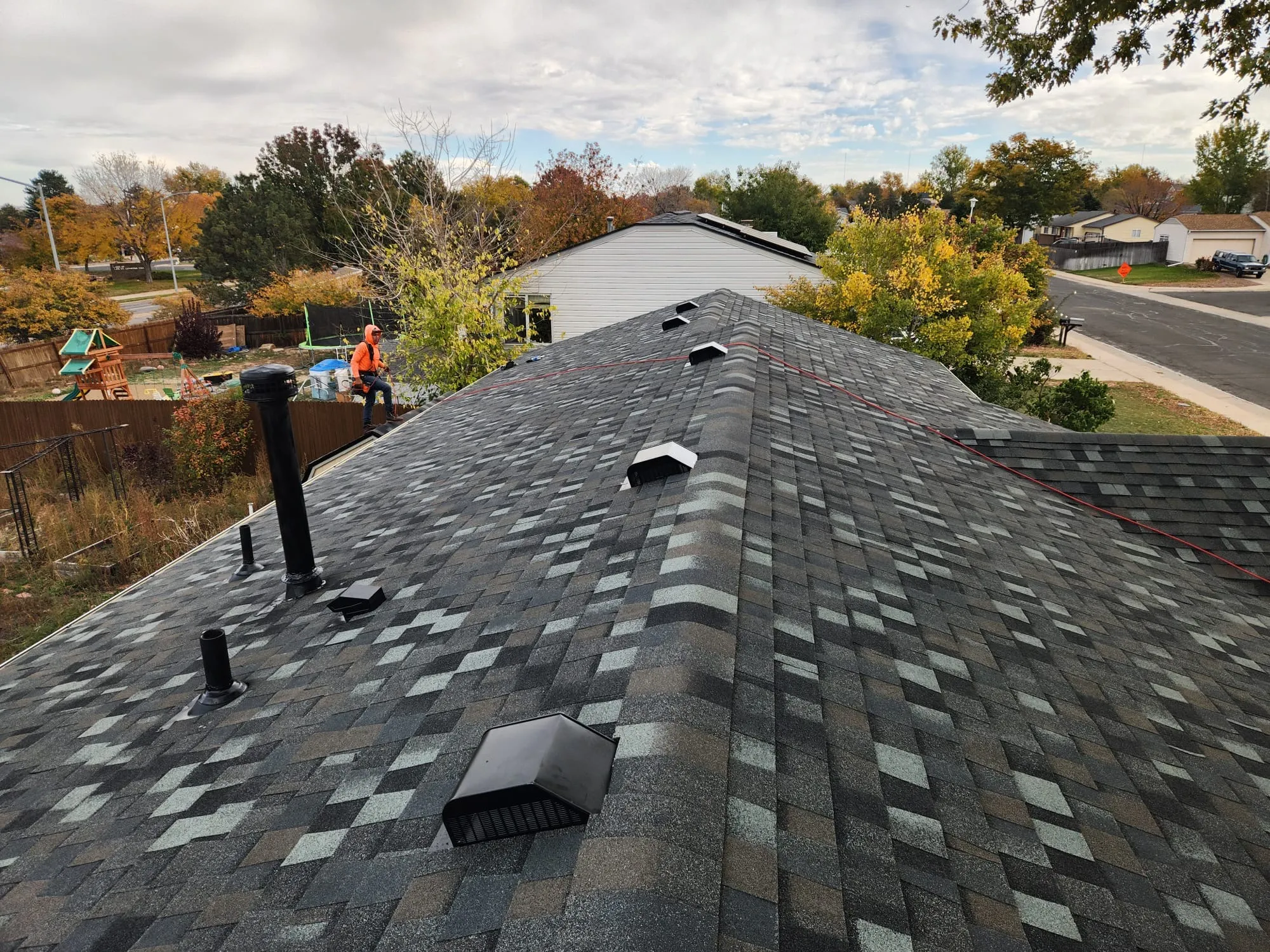 Finished shingle roof on-roof view