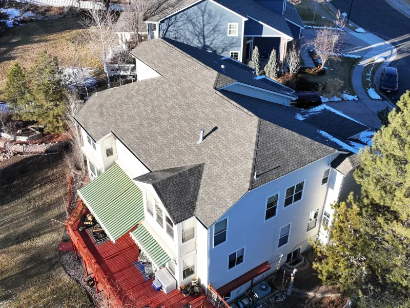 Completed asphalt shingle roof replacement on a Colorado home