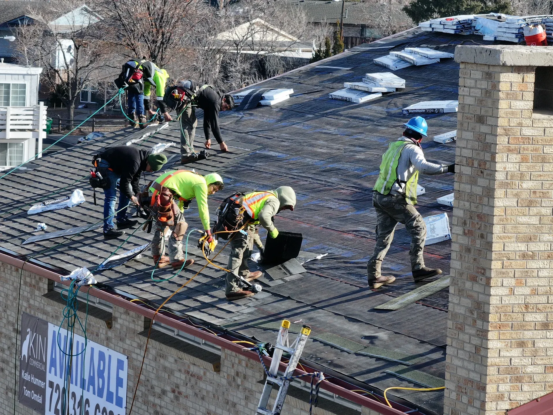 Full crew on commercial church roof