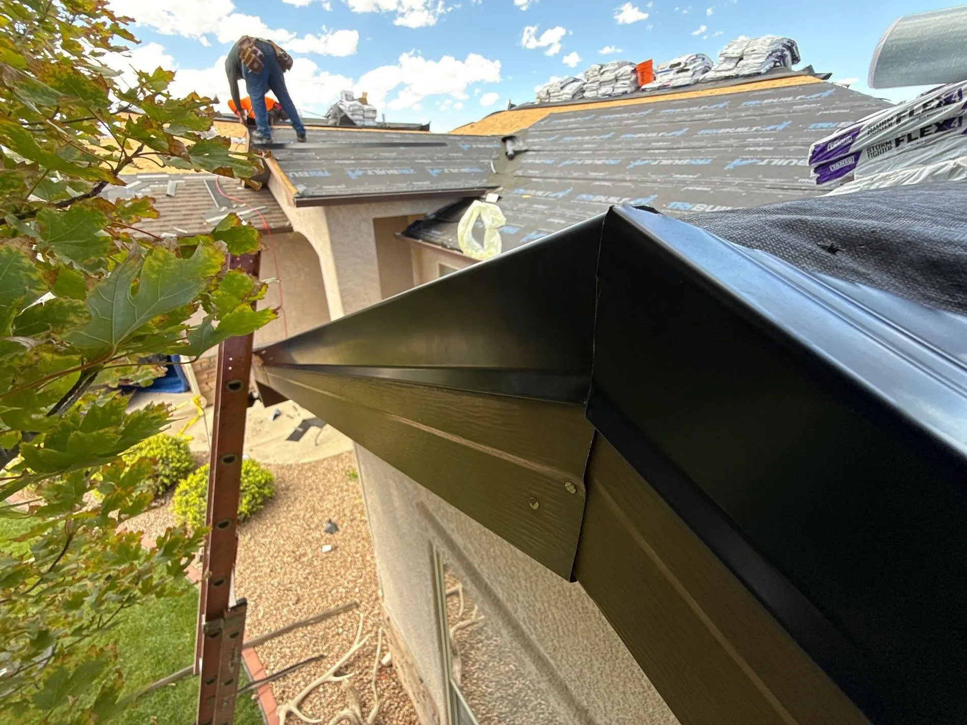 Crew working on roof edge
