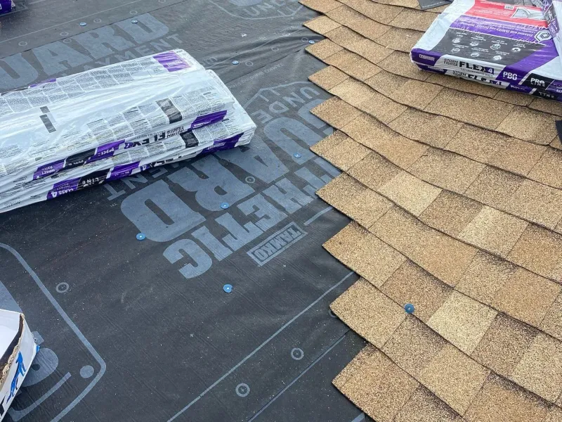 Roof replacement in progress — new decking and underlayment