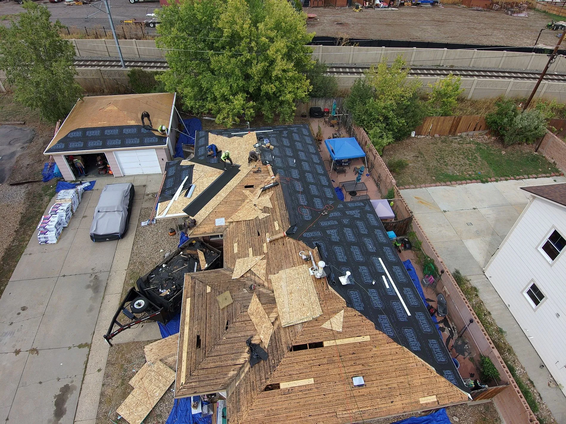 Crew working on tear-off