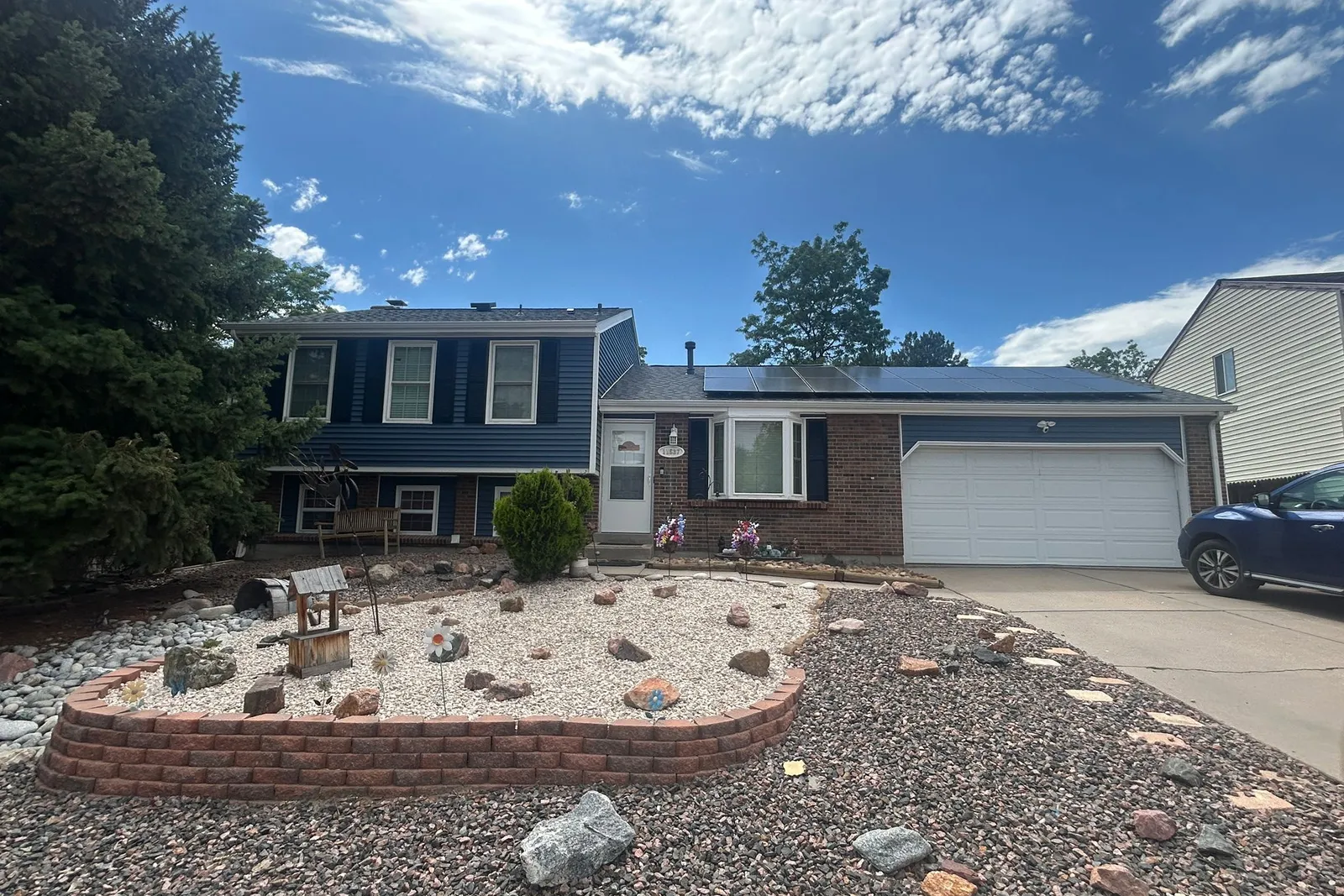 Completed blue siding and white trim on a Colorado home