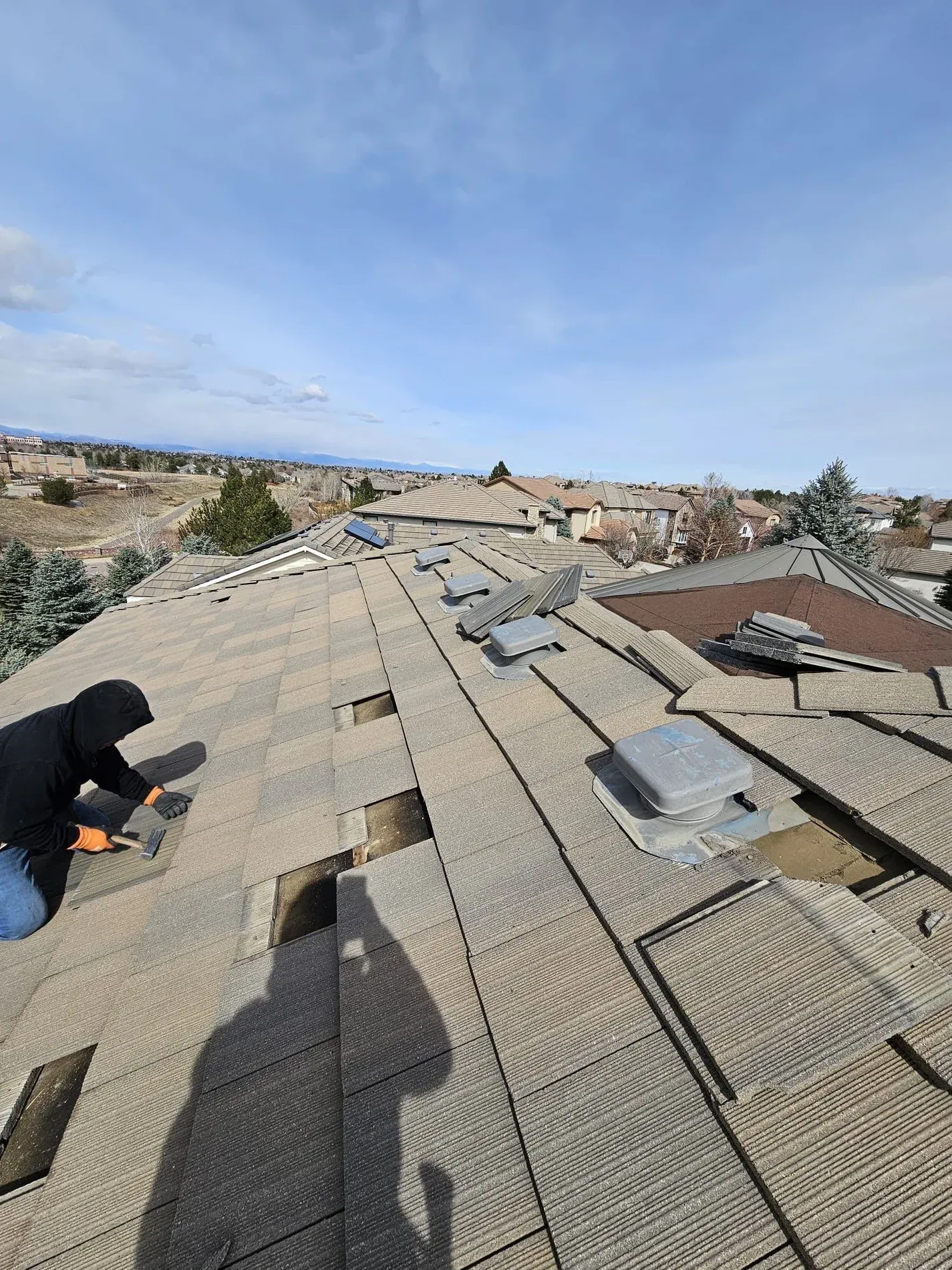 Crew member setting tile